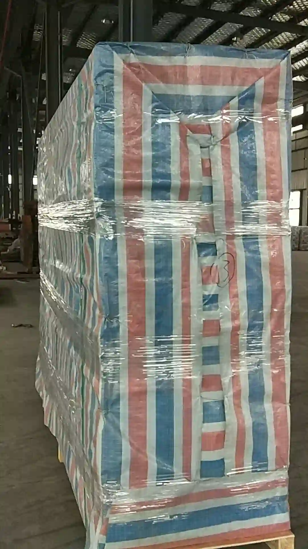 Cable tray bundle wrapped and stretch-filmed on a pallet, ready to ship